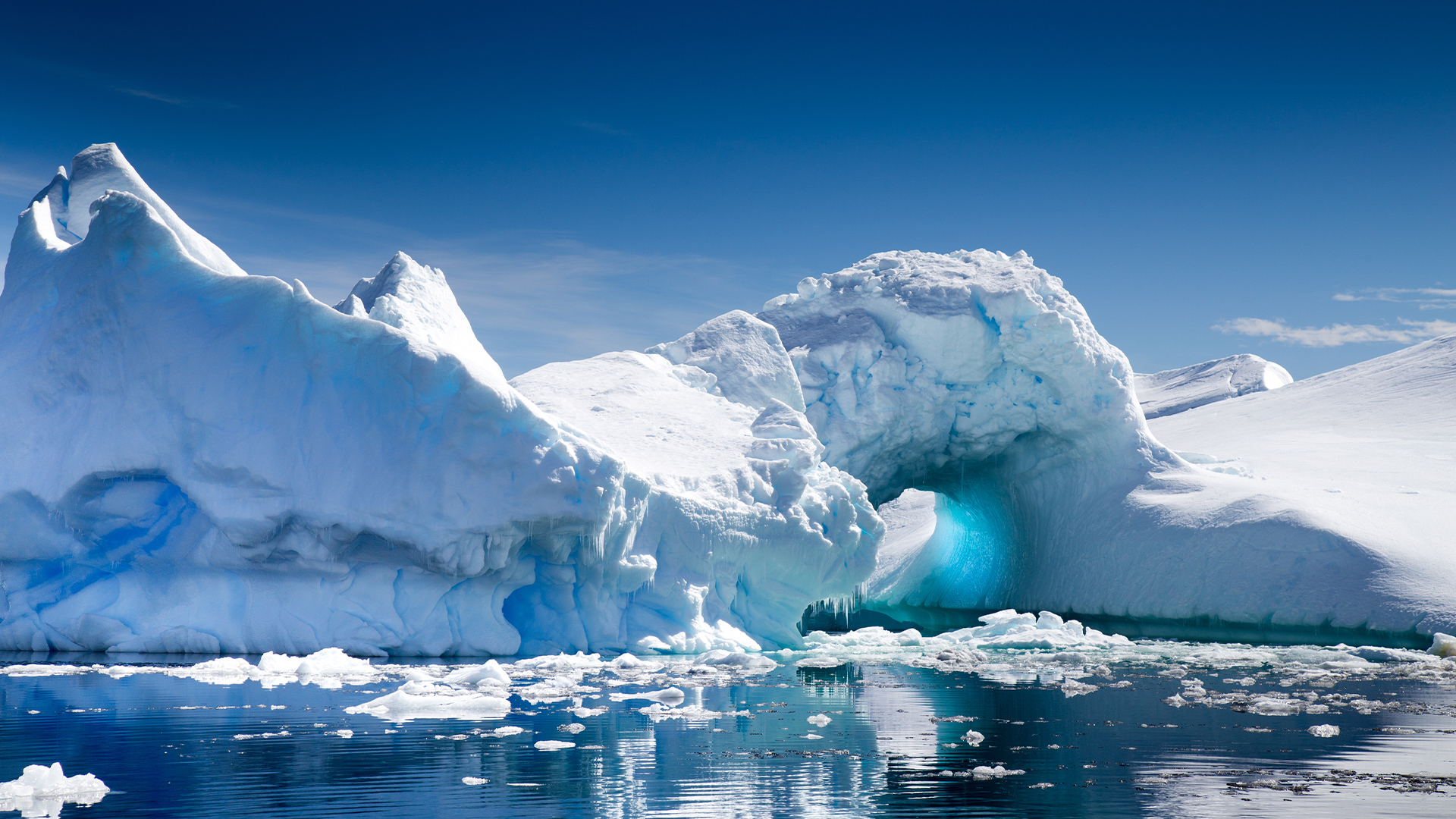 Destinations: Blue Iceberg floating in Antarctica