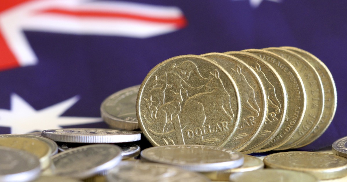 Australian dollars with Australian flag in the background