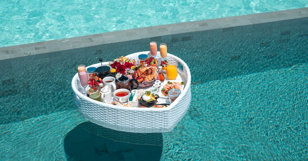 Breakfast in swimming pool, floating breakfast in heart tray