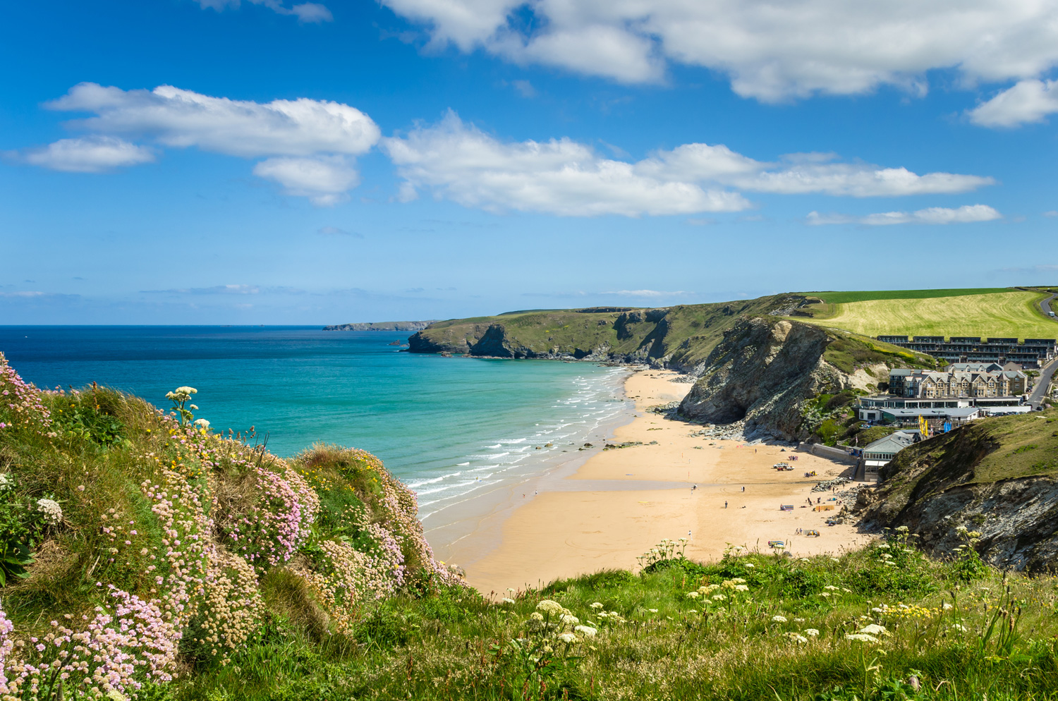 Coast of Cornwall with a Sandy Beach and Blue Sky