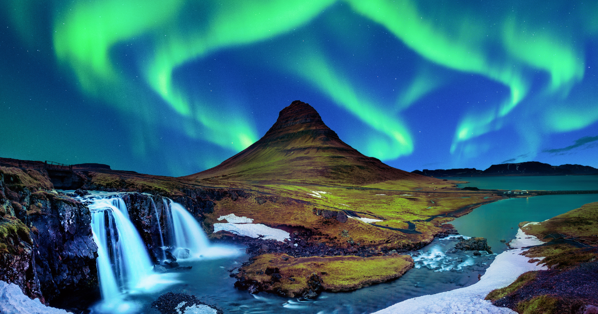 Iceland waterfall with northern lights