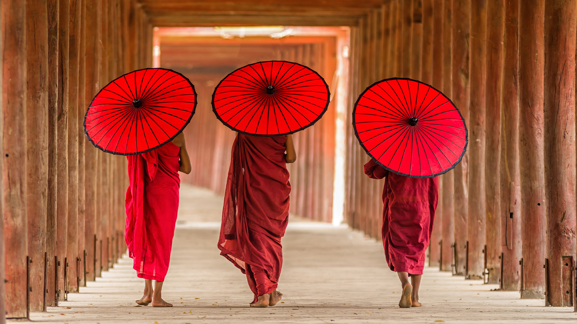 Destinations: Three Buddhist Novice Walking in Pagoda, Myanmar, Asia