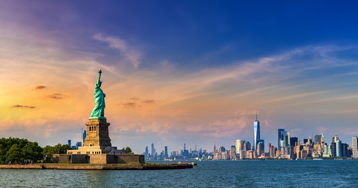 Panorama of Statue of Liberty against Manhattan cityscape background in New York City, NY, USA