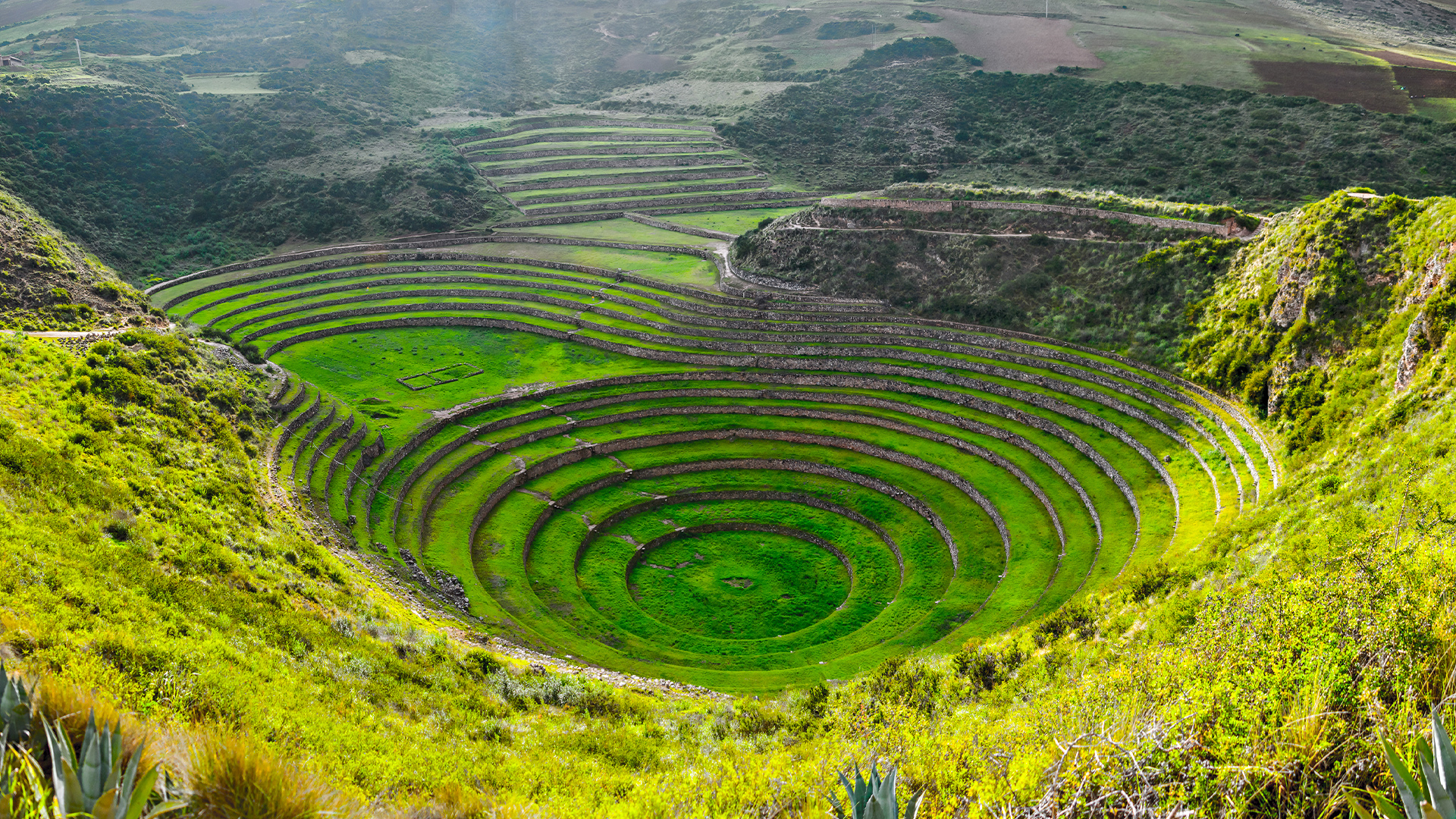 Destinations: View above the ancient Inca circular terraces in Moray, Peru, South America