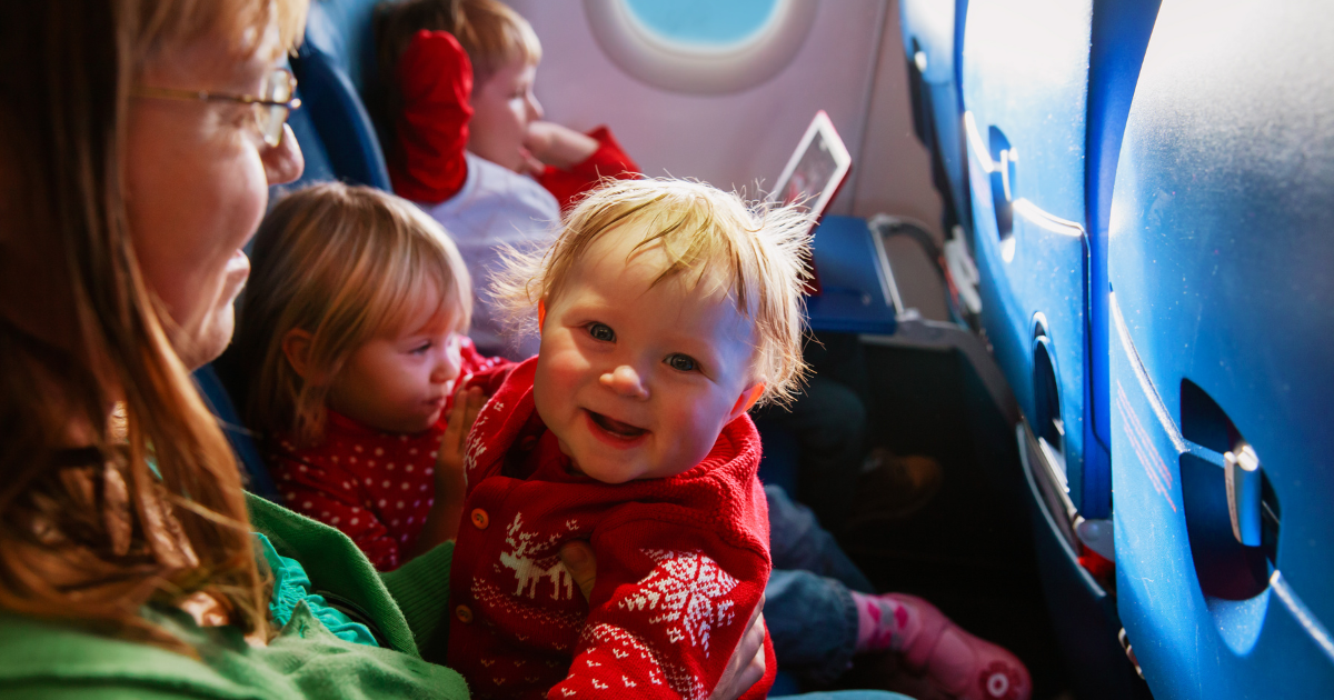Mum Travelling with Toddlers on an Aeroplane