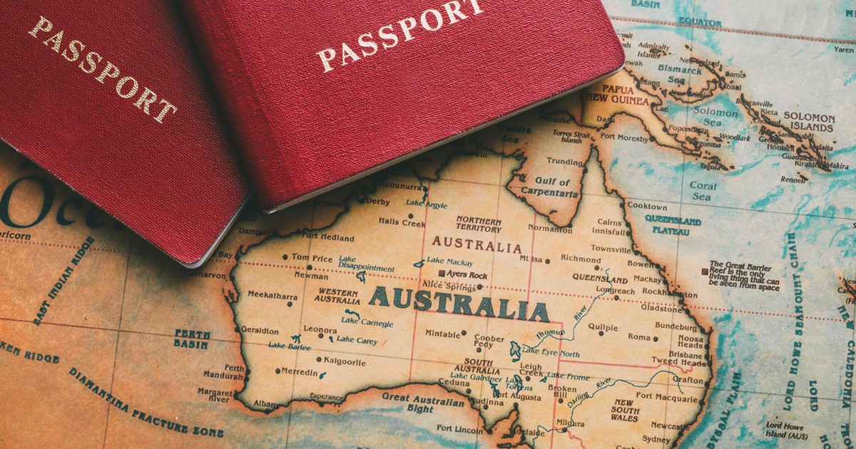 Two passports on map. Travel to Australia