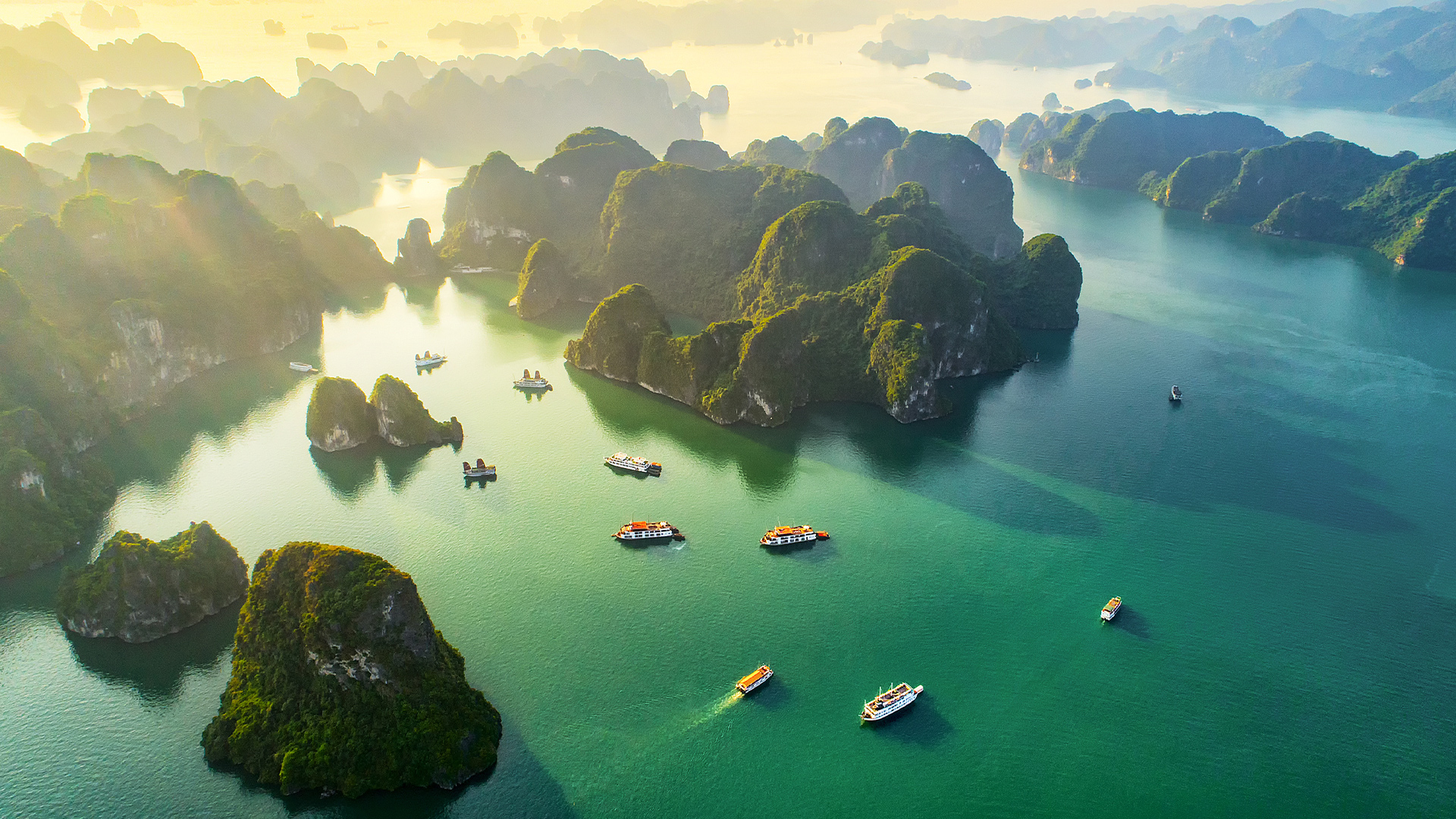 Destinations: Aerial View of Floating Fishing Village and Rock Island in Halong-Bay, Vietnam, Asia